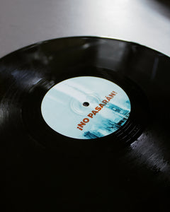 Vinyl record with a blue label on a white background "Extrawelt Artist" 